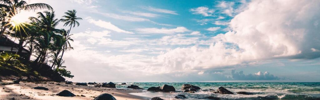 beach-clouds-daytime-994605